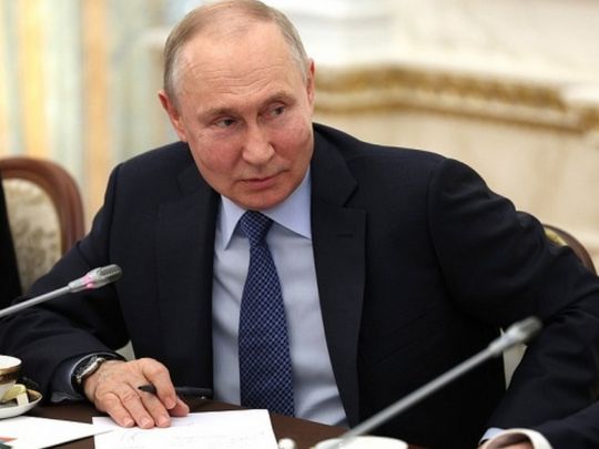 путін