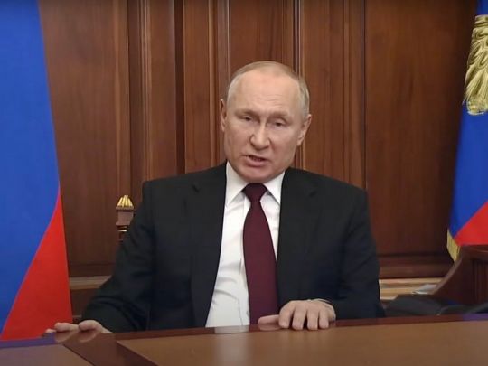 путін