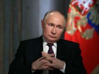 путін