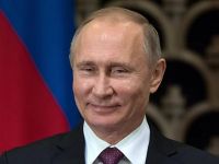 путін
