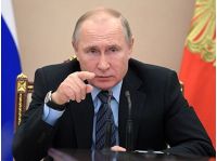 путін