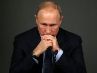 путін