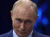 путін