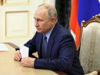 Путин