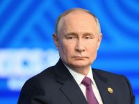 путін