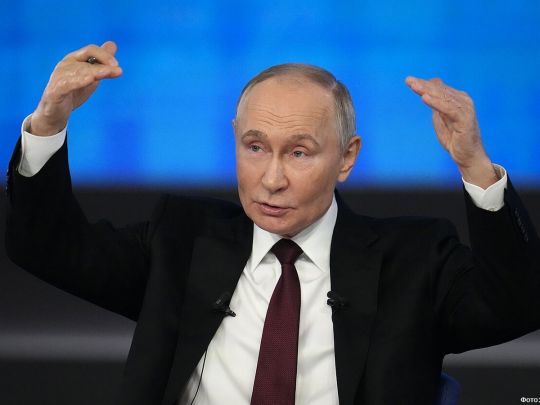 путін