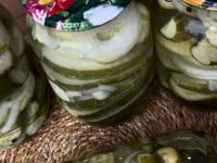 Як приготувати огірки на зиму з цибулею