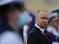 путін