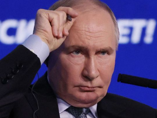 Путін
