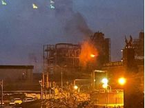 Горящий после удара БпЛА российский НПЗ