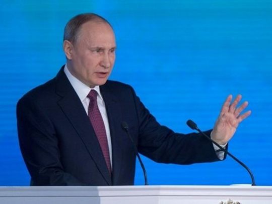 путін