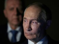 путін