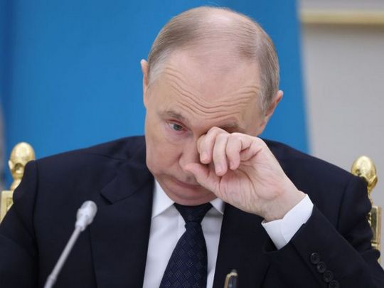 Путін