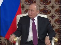 путін
