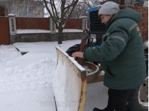 Оксана Рихлюк зі своїм трактором