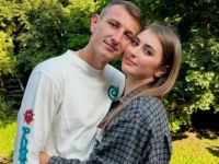 Дмитро Різник із дружиною