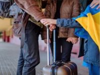 Біженці з України