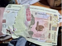 Фальшивые гривни враг сбросил в трех населенных пунктах. Фото горсовета Сум