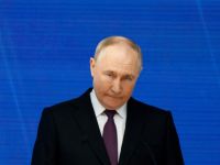 путін