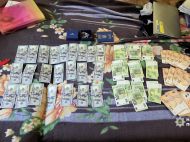 Елітні авто, готівка і&nbsp;фальшиві декларації: поліція проводить масштабні обшуки у&nbsp;посадовців ВЛК (фото)