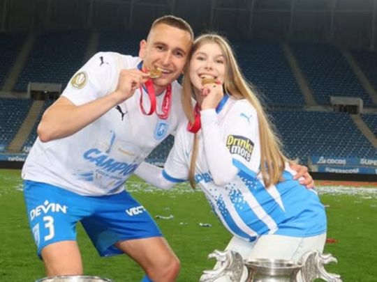 Олександр Романчук з дружиною Евеліною
