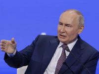 путін