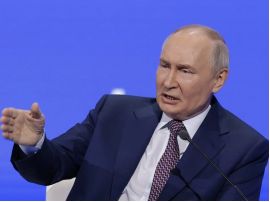 путін