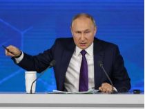 путін
