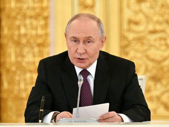 Путін